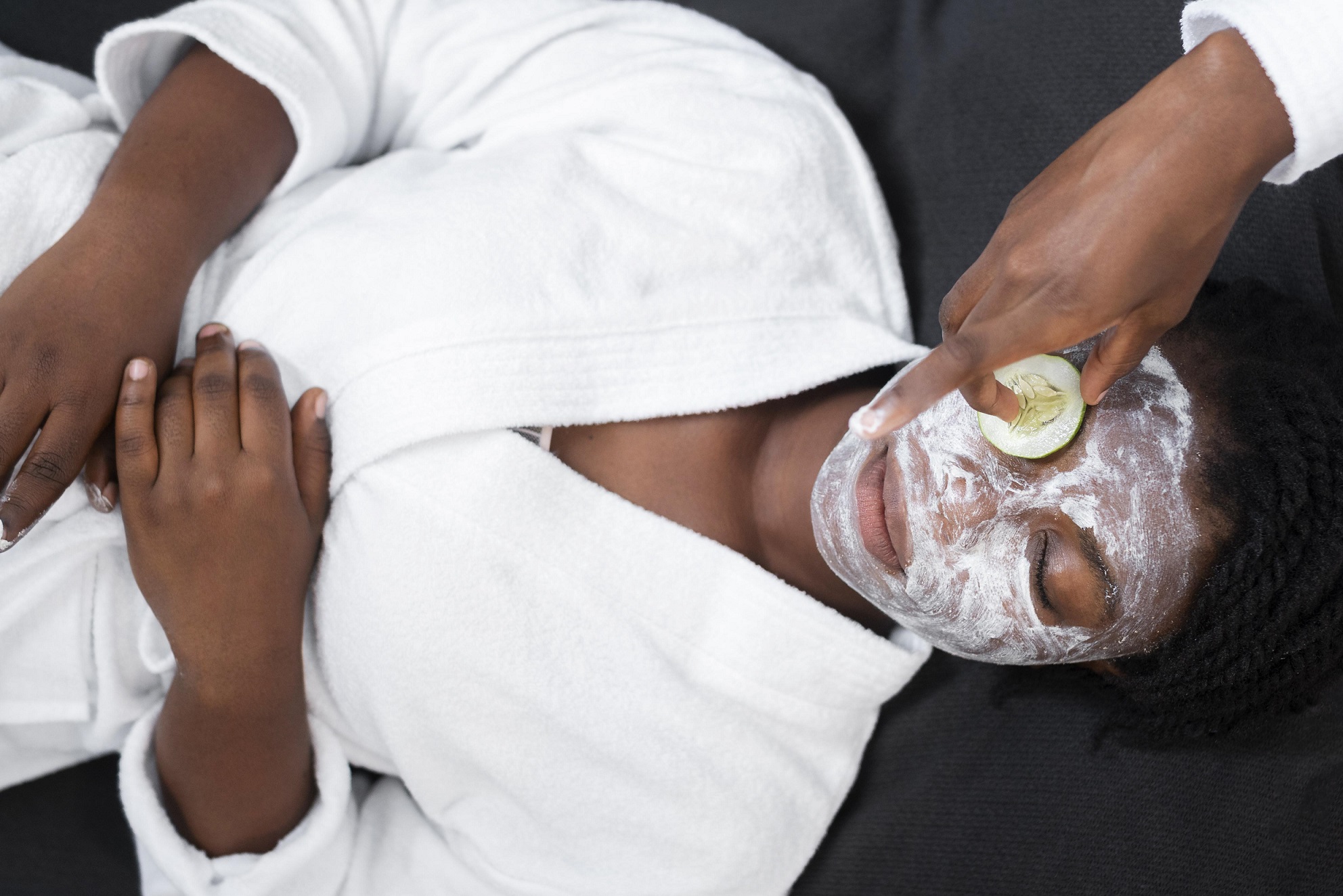 beautiful-woman-doing-facial-treatment-home
